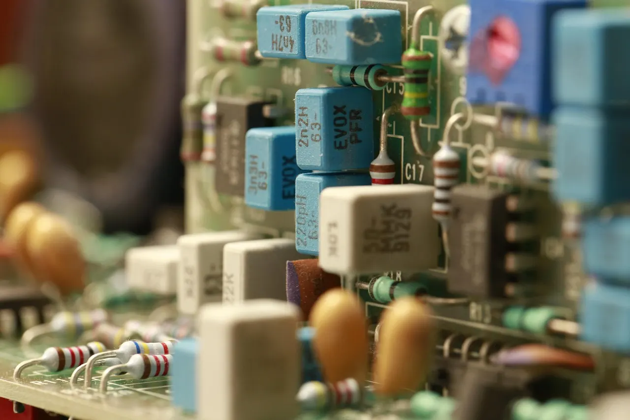 Digital illustration of a red kill switch button on a circuit board representing AI regulation