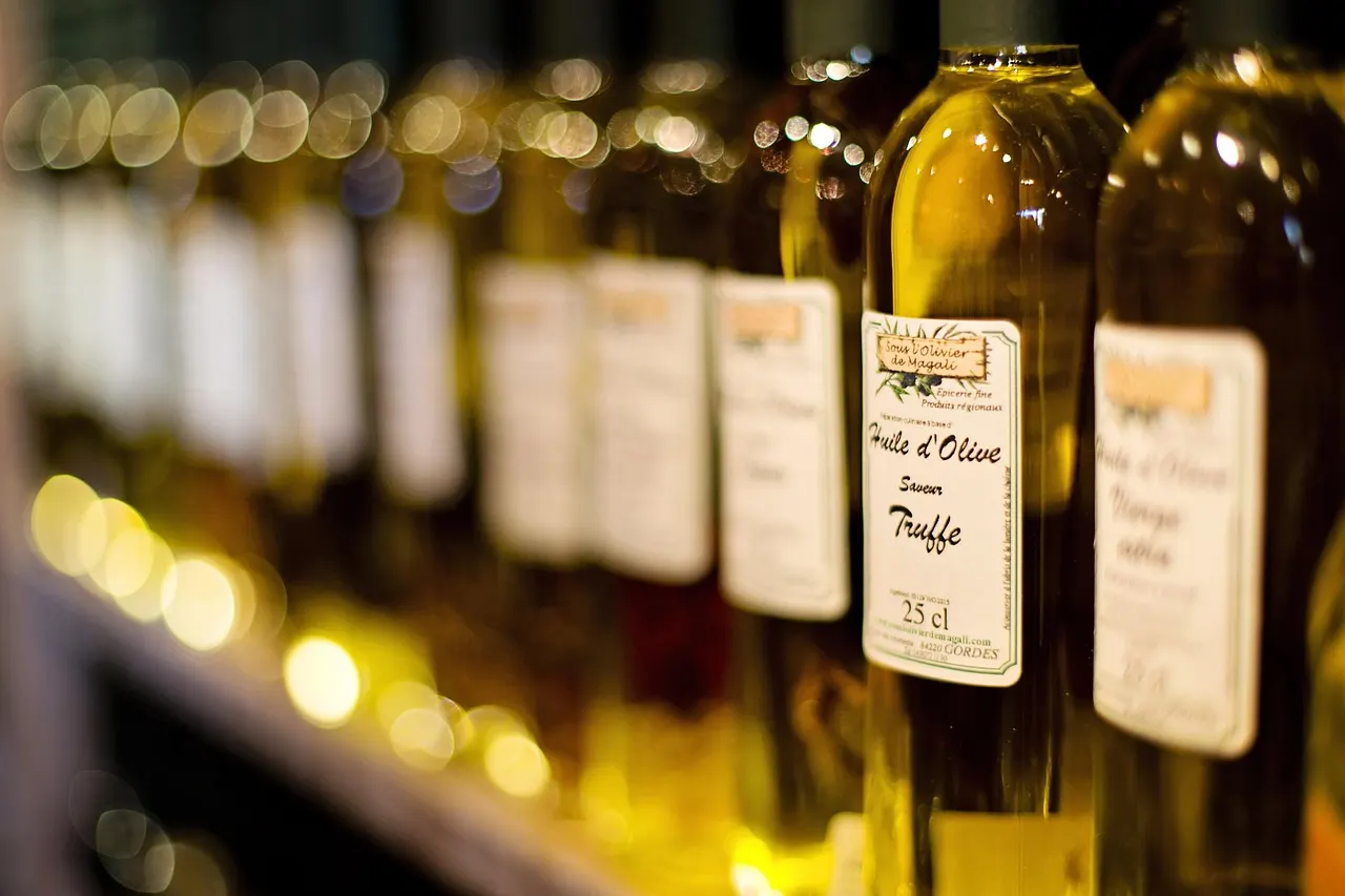 beef tallow as a small flavor addition next to a bottle of olive oil