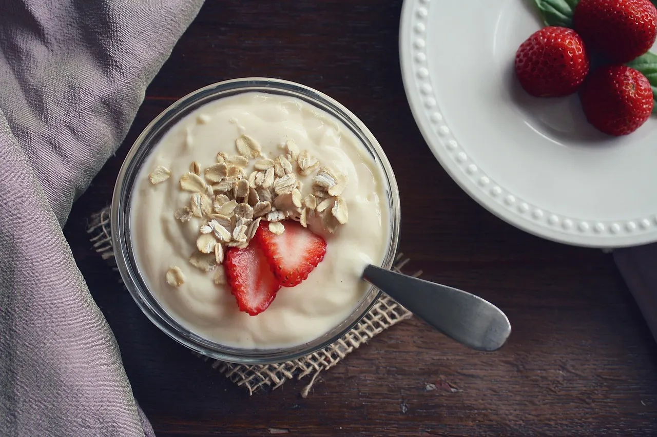 Potassium-rich DASH diet foods including banana, sweet potato, yogurt and leafy greens