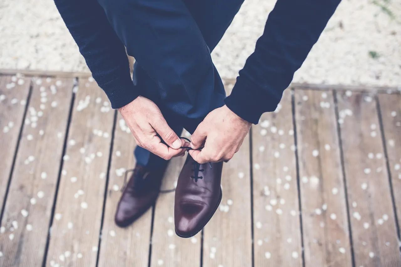 Tying shoes at the door — an instigation habit cue that keeps workouts consistent