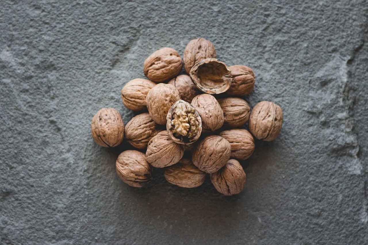 Whole food diet swap: fresh vegetables, fruit and grains beside ultra-processed packaged snacks