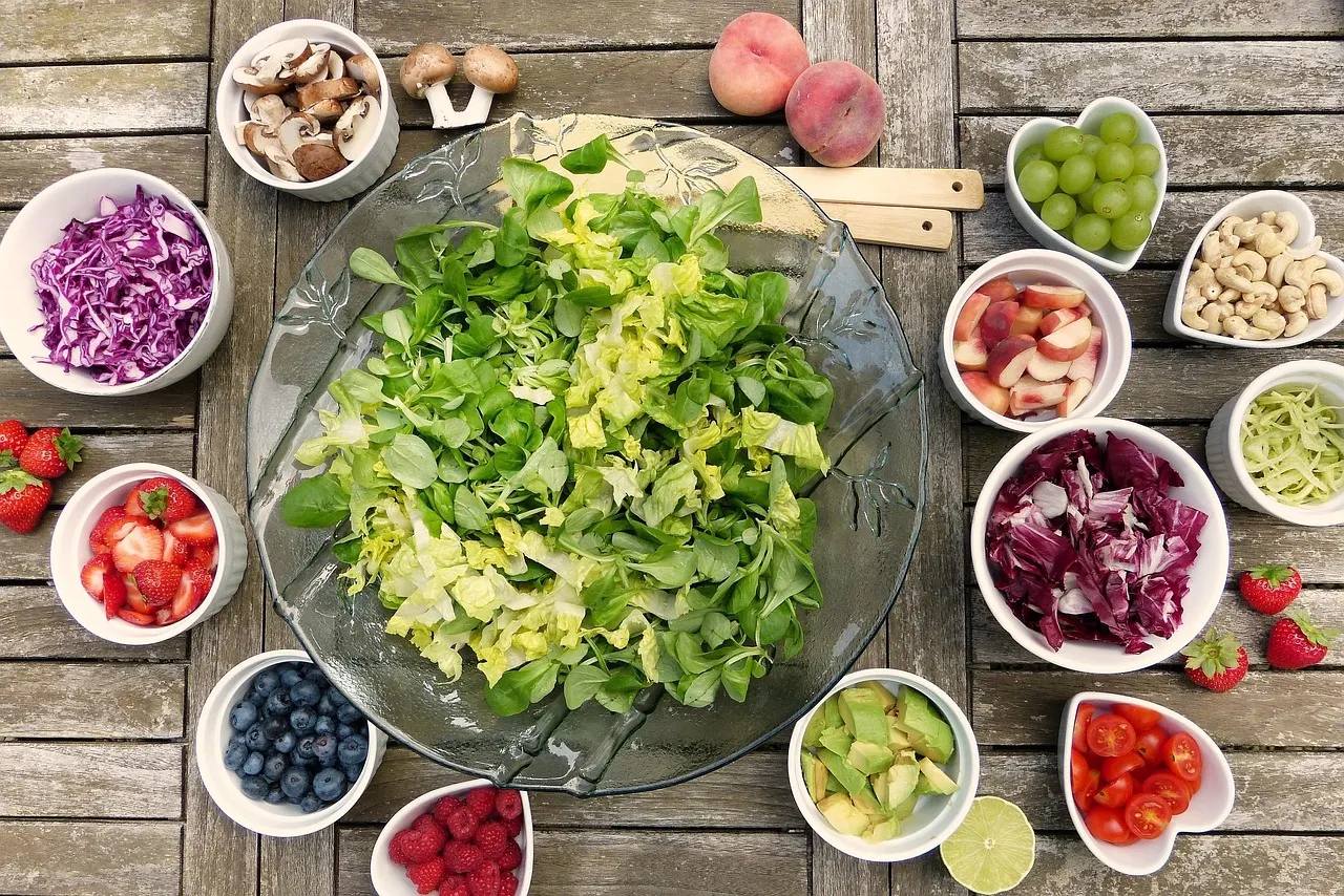 Whole food meal prep: portioned bowls of vegetables, grains and protein