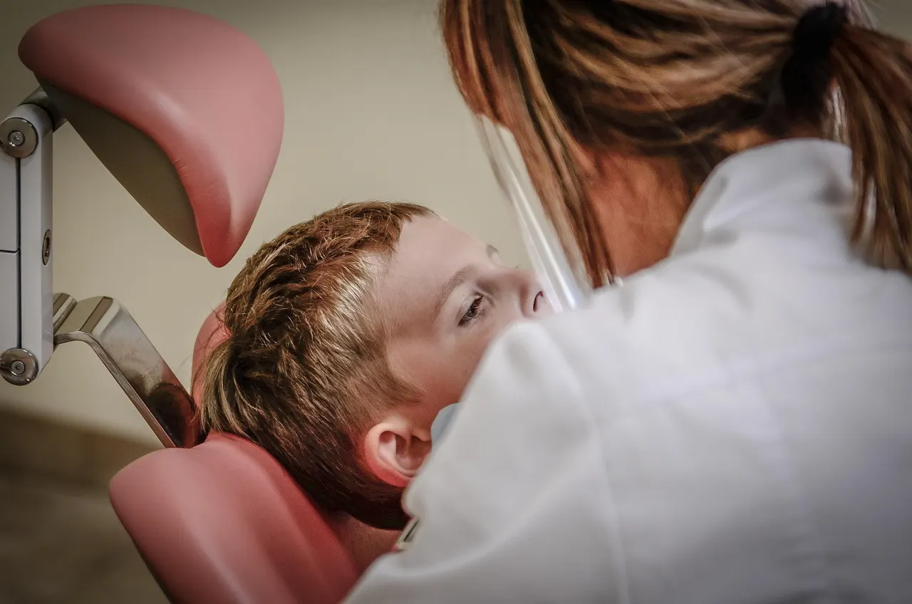 A patient discussing symptoms with a healthcare provider