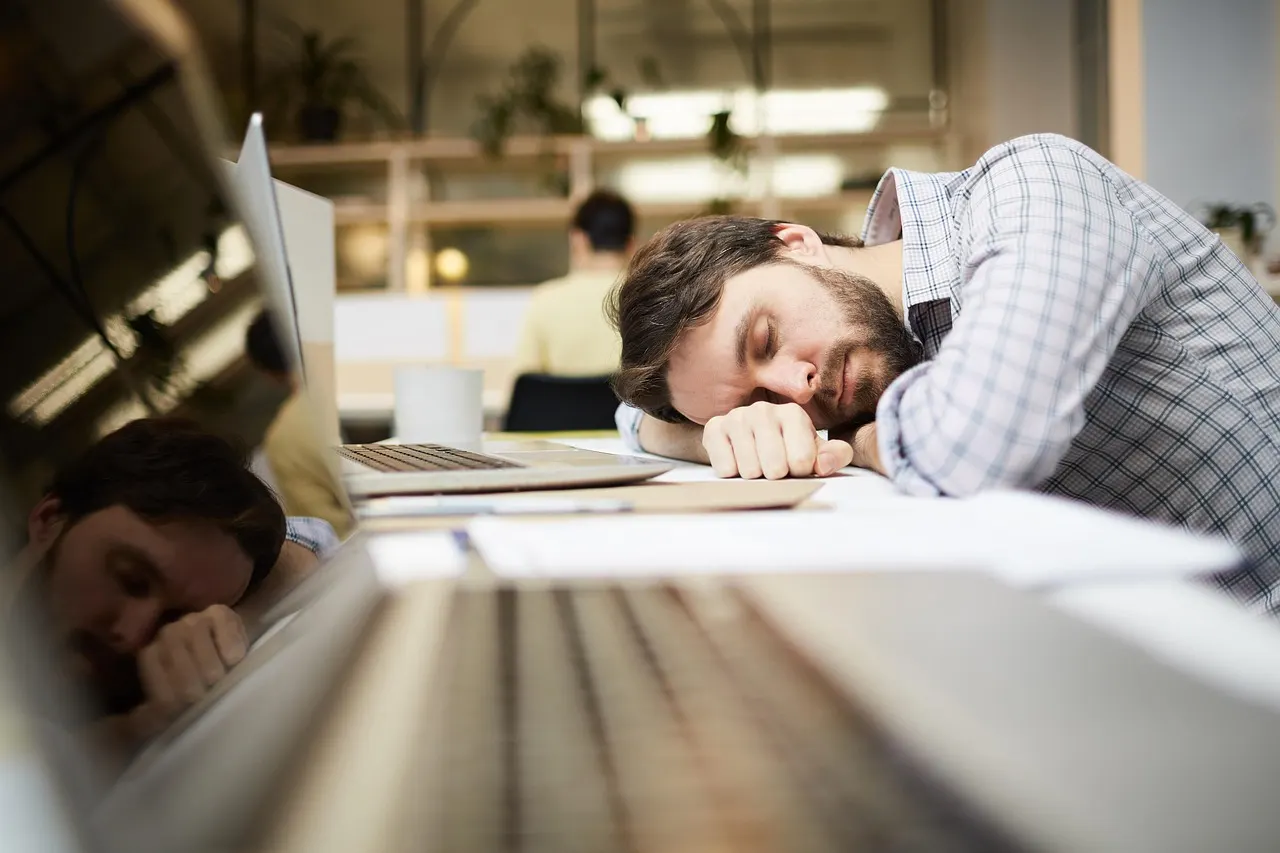 Overwhelmed employee experiencing workplace burnout.
