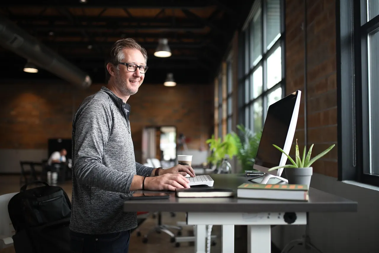 A focused professional working with high energy during the daytime